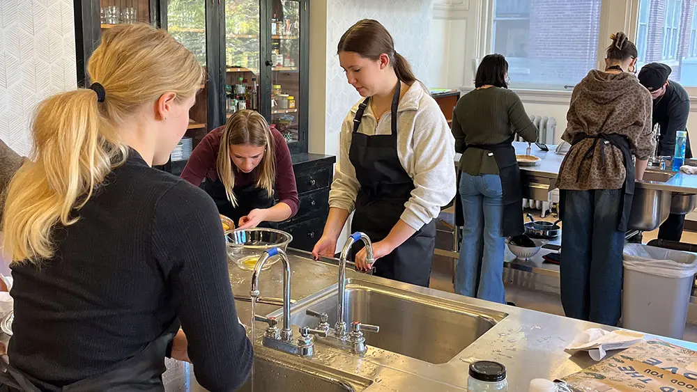 Students cooking in the Moore Family Center